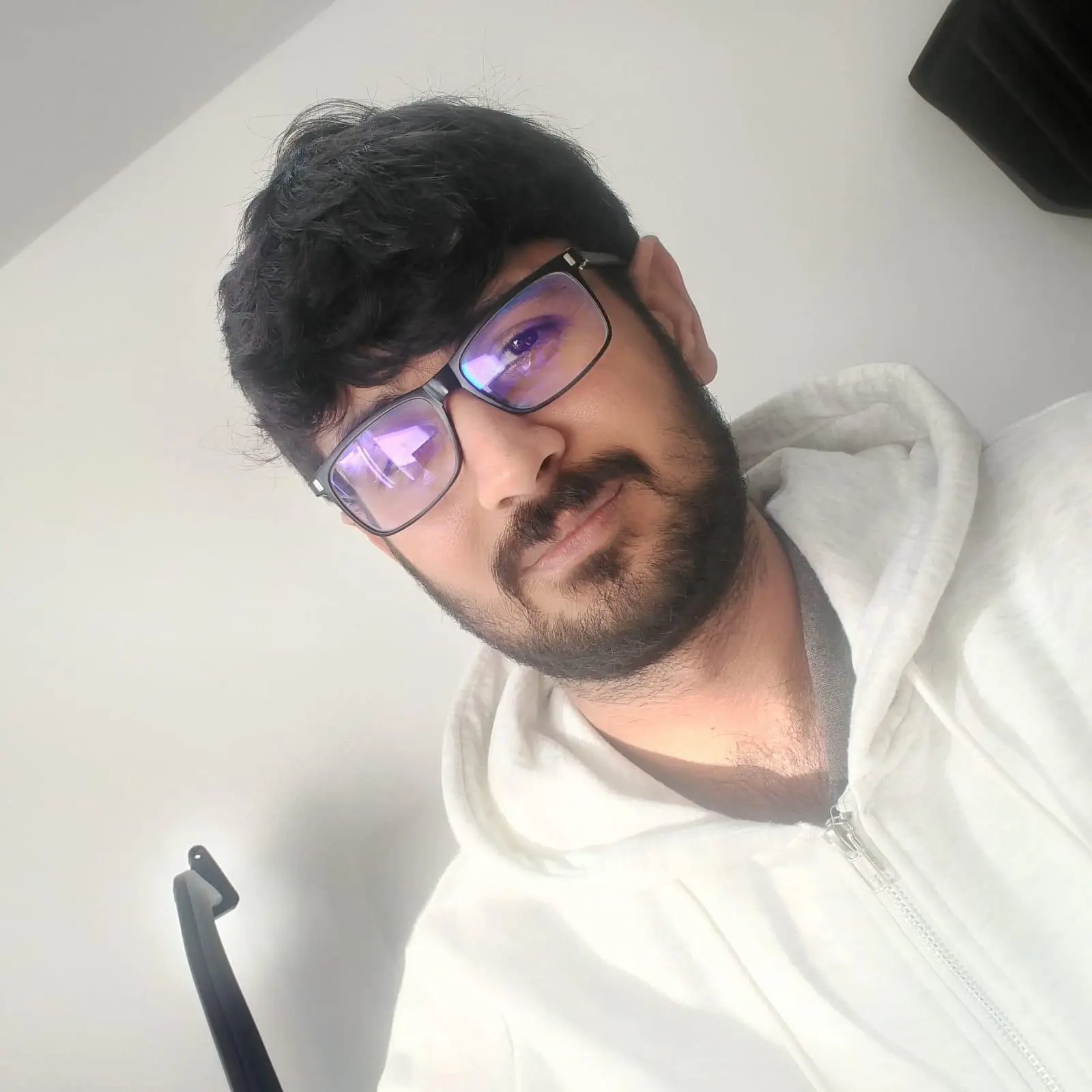 CTO analyzing code on a laptop